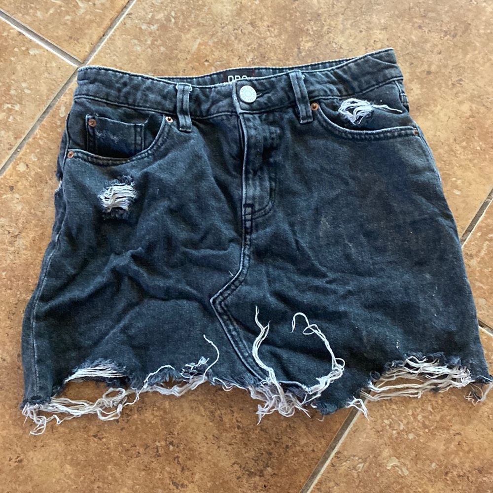 Black distressed denim skirt